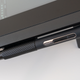 A fabric loop on the side of the Cintiq 16 provides a place to quickly and securely store its stylus.